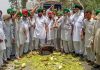 Farmers throw vegetables on a road during a state-wide protests, at Bagha Purana in Moga district of Punjab on Friday
